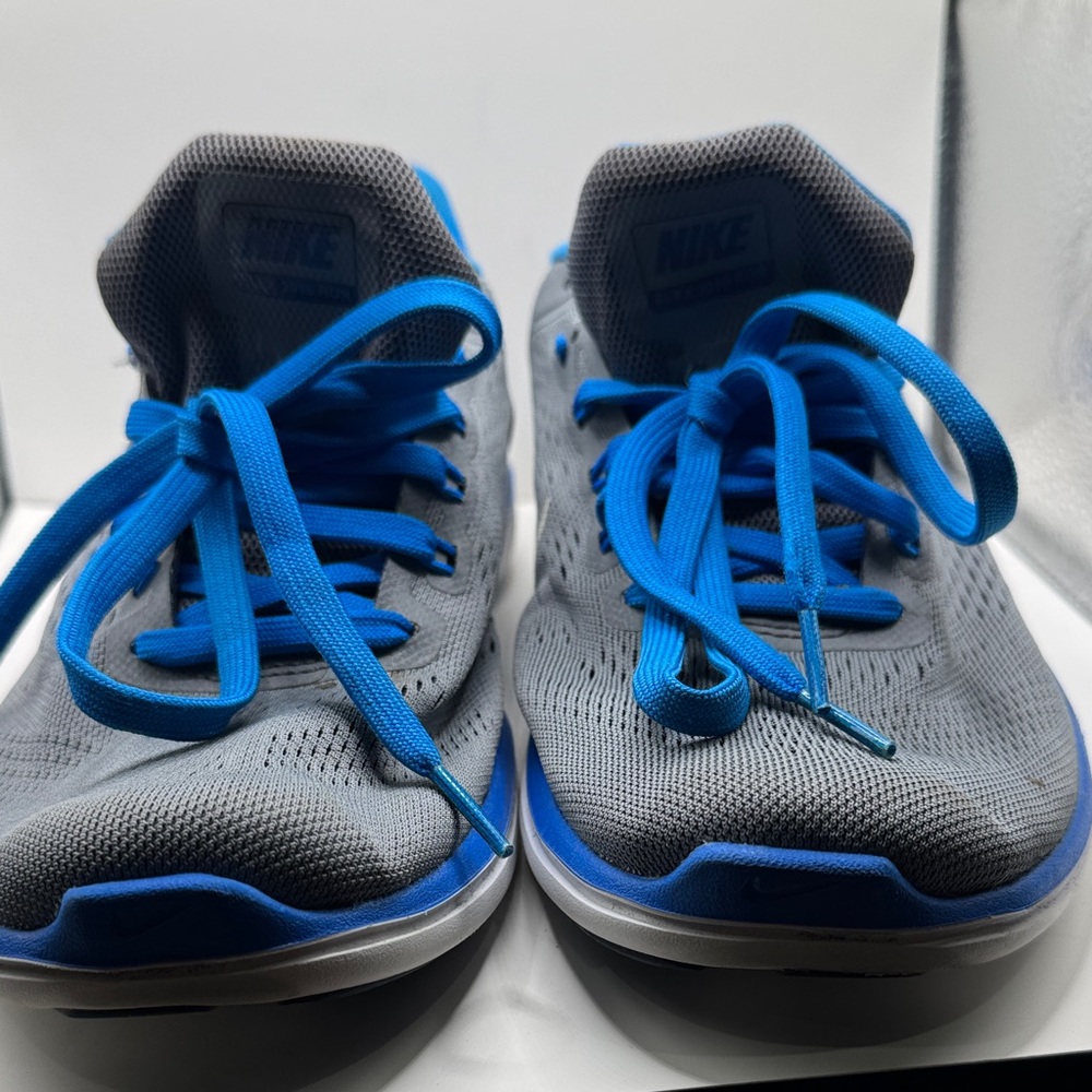 Nike Gray Sneakers with Blue Accents